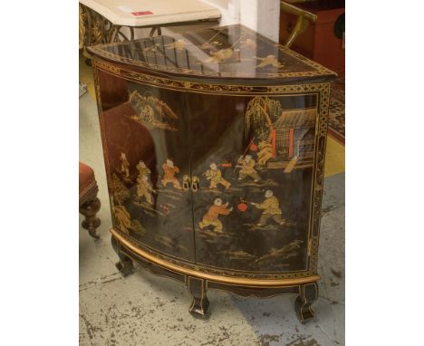 CHINESE CORNER CABINET, lacquered effect and Chinoiserie decorated with figures having two panelled doors enclosing a shelf, 