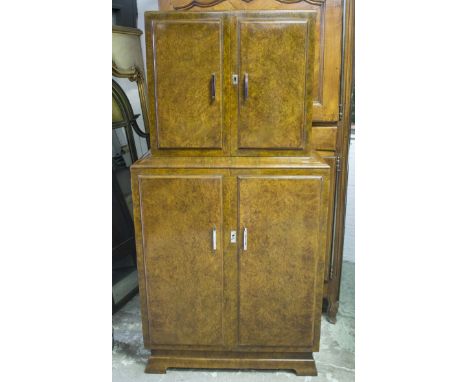 COCKTAIL CABINET, early 20th century Art Deco, burr walnut, with twin door mirrored and light fitted cabinet above two furthe