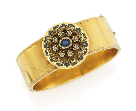 MEDALLION-ARMSPANGE. Material: 750/- Gelbgold, Punze. Gesamtgewicht: ca. 37,8 g. Maße: Innendurchmesser 5,0 x 5,5 cm. Diamant