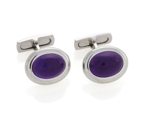 AMETHYST-MANSCHETTENKNÖPFE. Material: 750/- Weißgold, Punze. Gesamtgewicht: ca. 19,6 g. Maße: Länge 2,5 cm, Top 1,8 x 1,4 cm.