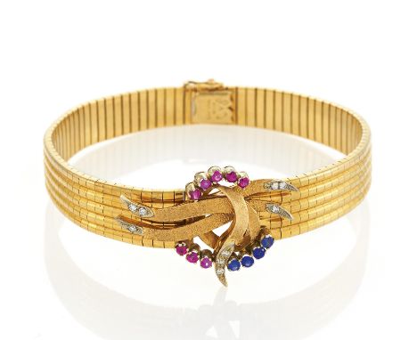 RUBIN-SAPHIR-ARMBAND. Datierung: Um 1960. Material: 750/- Gelbgold, Punze. Gesamtgewicht: ca. 42,5 g. Maße: Länge 18,5 cm. Di