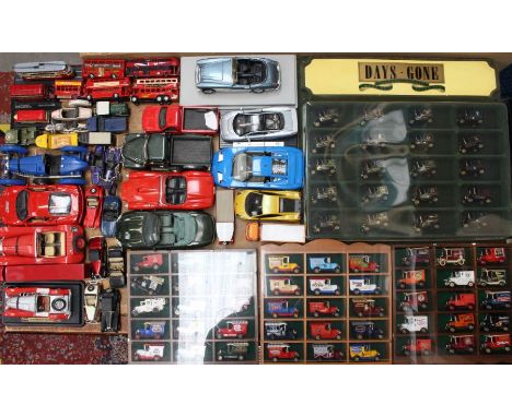 Diecast: A collection of assorted loose and unboxed diecast vehicles to include: Days Gone display cabinet, as well as three 