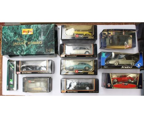 Diecast: A collection of boxed Maisto and Bburago 1:18 and 1:12 Scale vehicles. Together with other diecast vehicles. 11 item