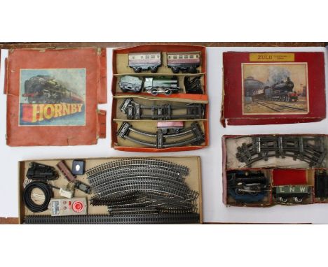 Model Railway: A boxed Zulu Clockwork Train Set, containing: locomotive and tender with one rolling stock wagon, and track; a
