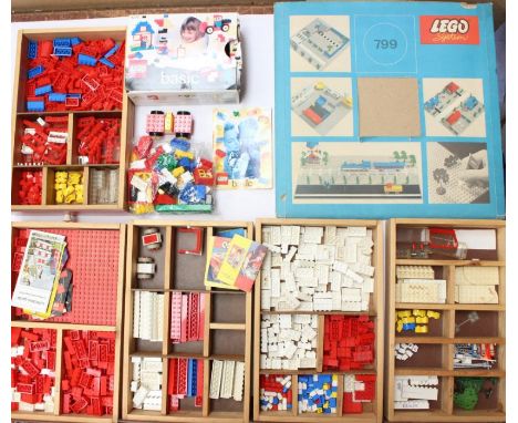 Lego: A collection of assorted Lego, mostly unboxed and loose within one cabinet; together with a boxed Lego Basic Ref 4212 s