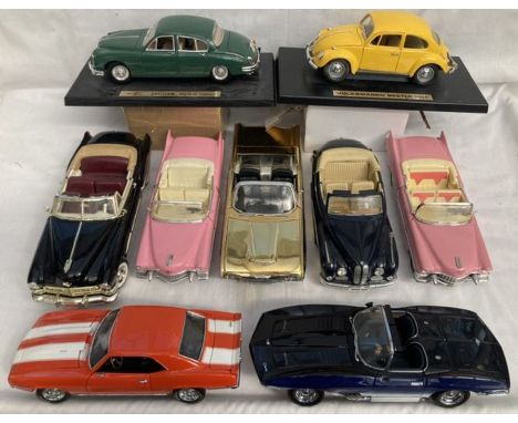 Diecast: A collection of 1:18 scale model cars to include Maisto, Revell, UT, Road Signatures. Previously displayed so minor 