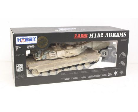 Hobby Engine: A boxed Hobby Engine, M1A2 Abrams, Scale 1:16, Item No. 0717. Original box, shelf wear to box. Contents appear 