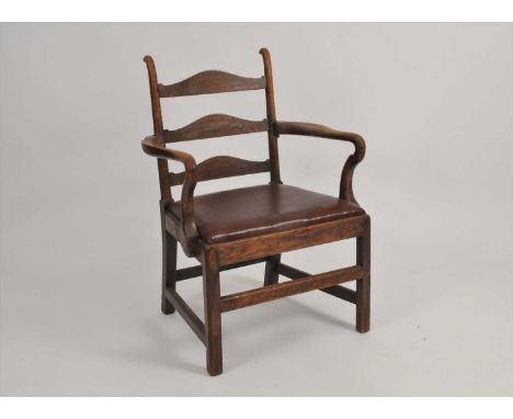 A late 19th century oak arm chair, with a swept ladder-back and swept arms above a drop-in seat, raised on squared legs, 95 c