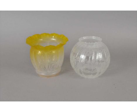 A uranium yellow tinted etched glass lamp shade and one other (2).