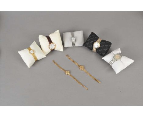 A 9ct gold Omega lady’s wristwatch, together with a 9ct gold Rotary wristwatch and three further Rotary wristwatches with box