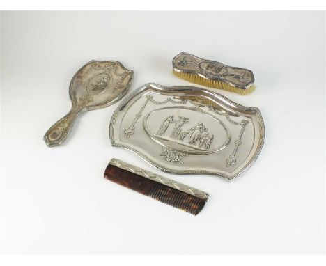 An Edwardian silver dressing table set, William Comyns, London 1905, comprising; a shaped rectangular tray, 29.5cm wide, weig