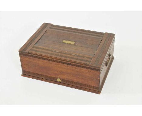 A late 19th / early 20th century silk-lined mahogany cutlery canteen by Tiffany &amp; Co, New York (empty), the slatted top w