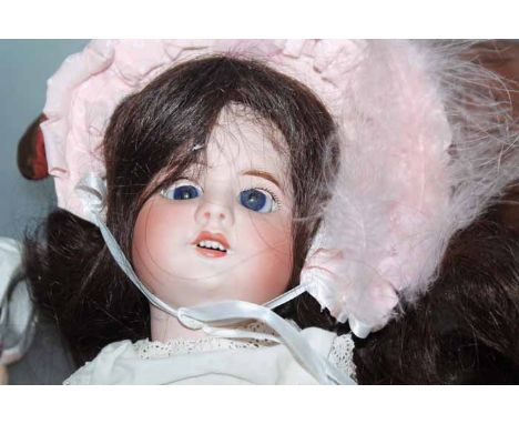 EARLY 20TH CENTURY SFBJ 60 BISQUE-HEADED DOLL(Société Française de Fabrication de Bébés et Jouets), with blue eyes, natural b