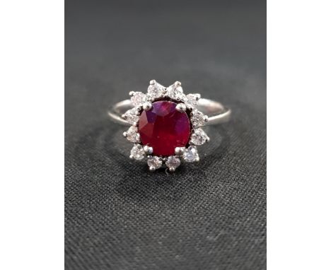 18 CARAT YELLOW GOLD DIAMOND AND RUBY RING WITH CIRCA 0.25 CARAT OF DIAMONDS