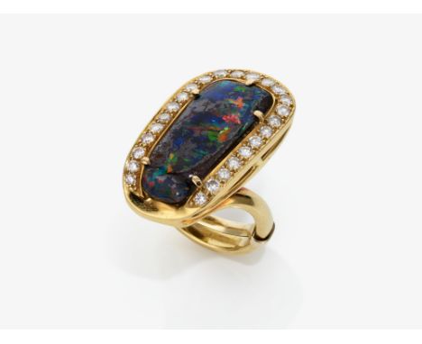 Ring mit Boulder-Opal und BrillantenGold 750/-, getestet. 25 Brillanten, zus. ca. 0.80 ct. 1 Boulder-Opal mit Matrix, ca. 21,