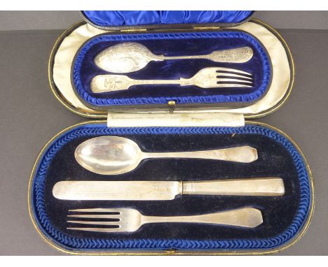 Silver knife, fork and spoon, 1916 and a spoon and fork, engraved and cased.