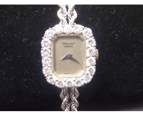 Evening watch by Chopard with diamond set rectangular bezel in 18ct white gold.   Condition Report.  No papers etc with it.Wi