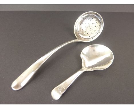 Silver caddy spoon by Wallis & Hayne, 1811 and a sifter, Birmingham 1903. (2)