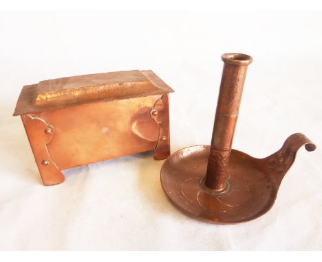 Arts and Crafts hammered copper chamber stick with flowerhead decoration 15.5cm high, unmarked, and a rectangular copper box 