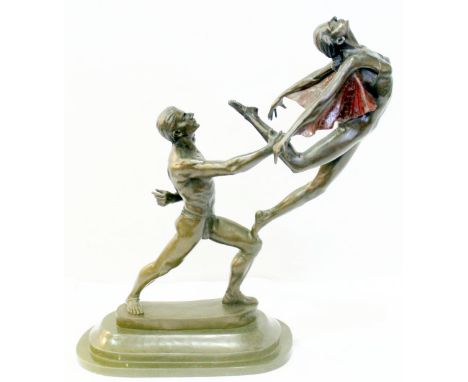 20th Century bronze figures of two dancers on an oval base, 59cm.