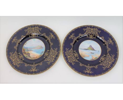 Two Royal Worcester plates both with hand painted scenes by J. Waters. St. Ives and St. Michael's Mount within a blue and gil