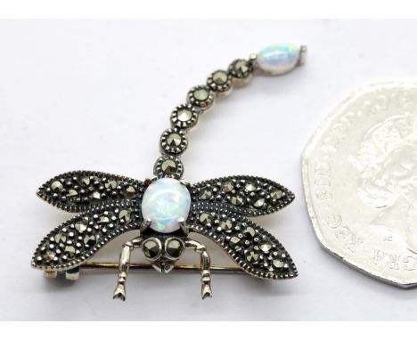 925 silver, opal and marcasite dragonfly brooch, L: 6 cm, 5.7g. P&amp;P Group 1 (£14+VAT for the first lot and £1+VAT for sub