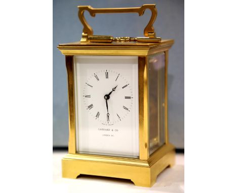 Garrards brass carriage clock in original box etc. P&amp;P Group 3 (£25+VAT for the first lot and £5+VAT for subsequent lots)