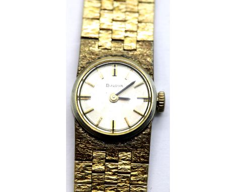 Ladies Bulova cocktail wristwatch with bark effect yellow metal strap, Not working at lotting. P&amp;P Group 1 (£14+VAT for t