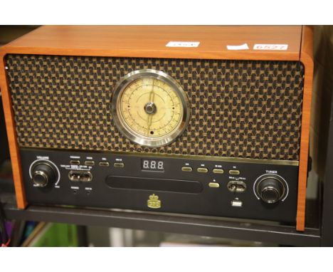 GPO Retro Chesterton Music Centre; 3 speed turntable: 33/45/78; CD/ MP3/ USB player; FM radio; MP3 recorder; wooden case. Thi