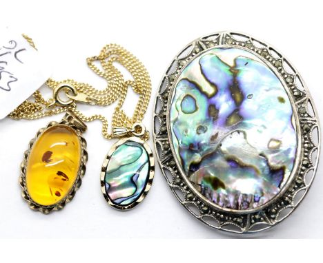 Amber silver set pendant, silver set Paua shell brooch and a matching pendant. P&amp;P Group 1 (£14+VAT for the first lot and