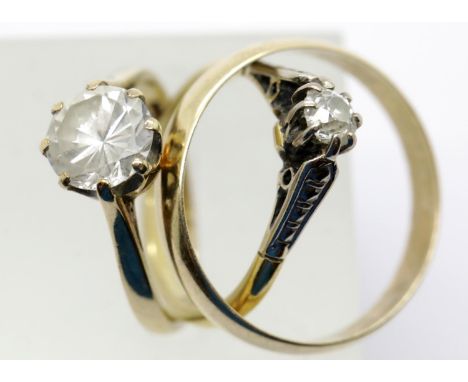 Two 9ct yellow gold stone set rings and a large unmarked yellow metal wedding band, various sizes, 8.0g. P&amp;P Group 1 (£14