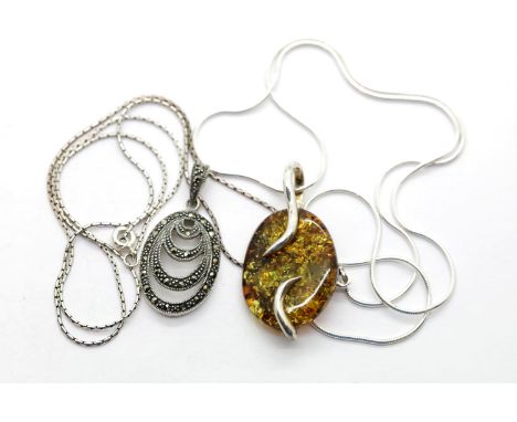 Two 925 silver pendants, one amber the other marcasite. P&amp;P Group 1 (£14+VAT for the first lot and £1+VAT for subsequent 