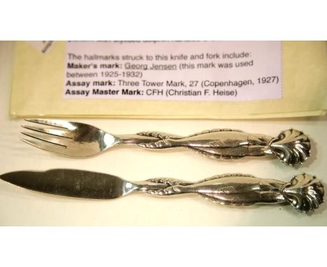 Georg Jensen 1927 fish knife and fork ornamental number 55 pattern with stylised dolphin handles and shell terminals. P&amp;P