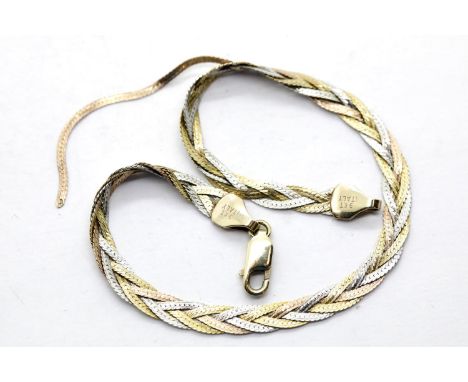 9ct yellow and white gold woven bracelet, 3.3g. P&P Group 1 (£14+VAT for the first lot and £1+VAT for subsequent lots)Conditi