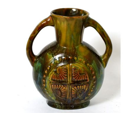 A Linthorpe pottery twin handled vase, shape no. 337, designed by Christopher Dresser 