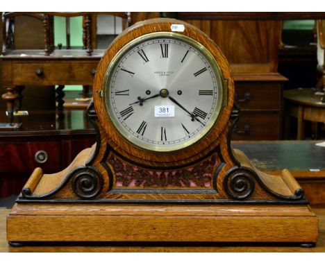 An oak bracket clock, Maple & Co Ltd 