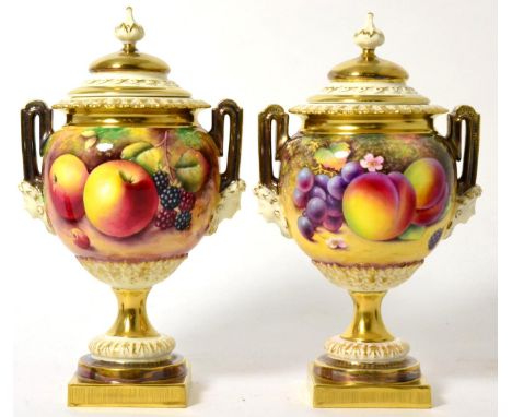 A pair of Royal Worcester vases, painted on both sides with fruit, one signed P Platt, the other T Nutt, shape 2363, 21cm hig
