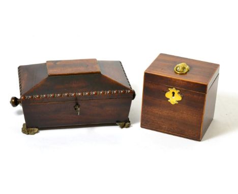 An early 19th century tea caddy and a Victorian mahogany box 