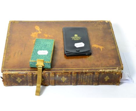 An enamel and gilt metal Royal Society of St George medal, a simulated shagreen compact/purse and an 1817 edition of Dicciona