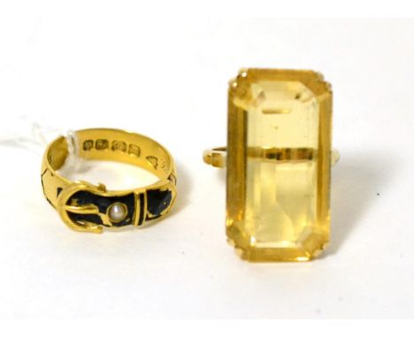 An 18 carat gold black enamel and pearl mourning buckle ring (a.f.), finger size P1/2 and a citrine ring stamped '9CT', finge