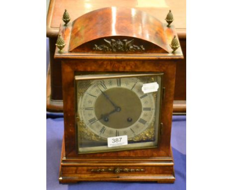 A walnut cased bracket clock