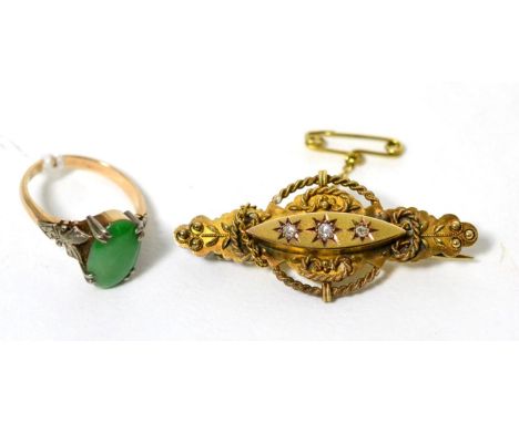 A jade ring, stamped '18ct' and a 15 carat gold diamond set Victorian brooch (2) Jade ring - Finger size K, 4.38g gross. Sign