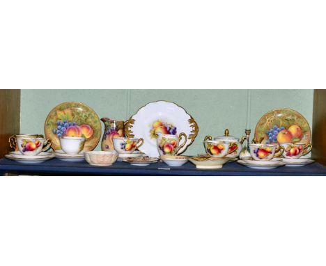A fruit painted porcelain tea service by Richard Budd; together with a pair of fruit painted plates by Worcester artist Franc