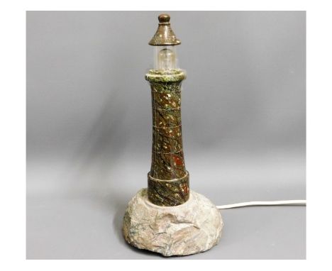 A Cornish serpentine light house table lamp, 14.25in tall 