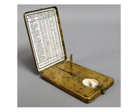 A brass pocket "Sunwatch" sundial &amp; compass 