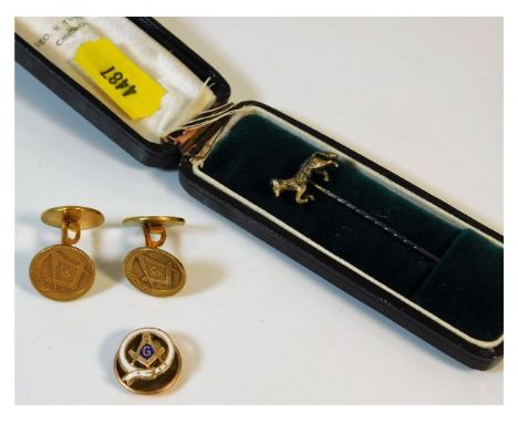 A 9ct enamelled American masonic lapel button, 2.5g, two yellow metal American cufflinks, electronically test as low carat go