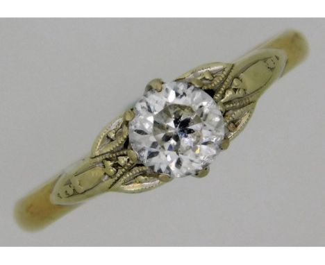 A 9ct yellow gold ring with white gold setting of paste stone, 2.5g, size P/Q