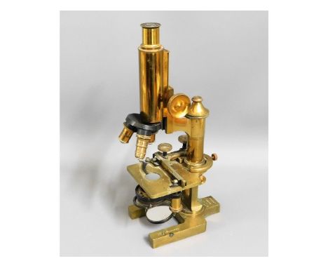 A brass Ross of London "Eclipse" microscope with E. Leitz lens, believed to be formerly the property of Sir. Henry J. Gauvin,