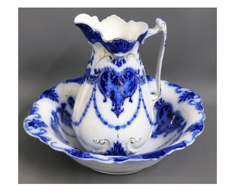 A large Victorian flow blue wash basin &amp; jug, basin 17.625in wide, jug 13in high