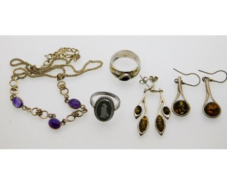 Two pairs of silver mounted amber earrings, a silver ring with sage Wedgwood jasper ware insert, a 0.950 silver ring with 14c
